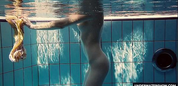  Hot big titted teen Lera swimming in the pool